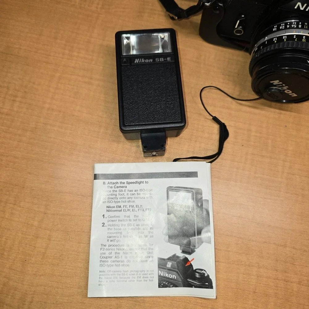 Nikon‎ EM 35mm Camera body lens series e flash cases for camera manuals timer